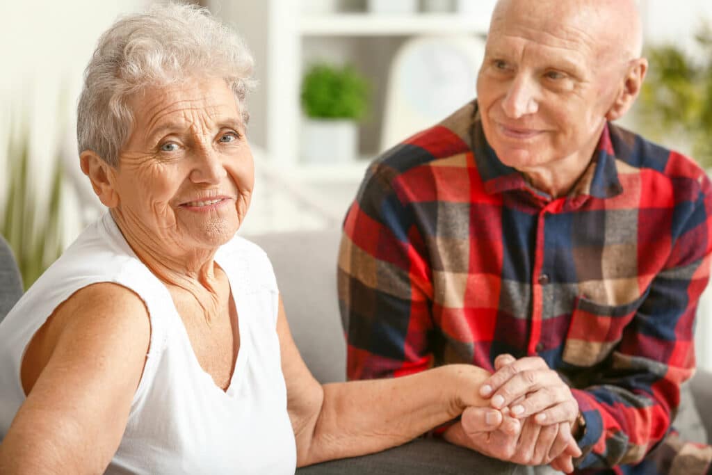 The Farrington at Tanglewood | Happy senior couple holding hands