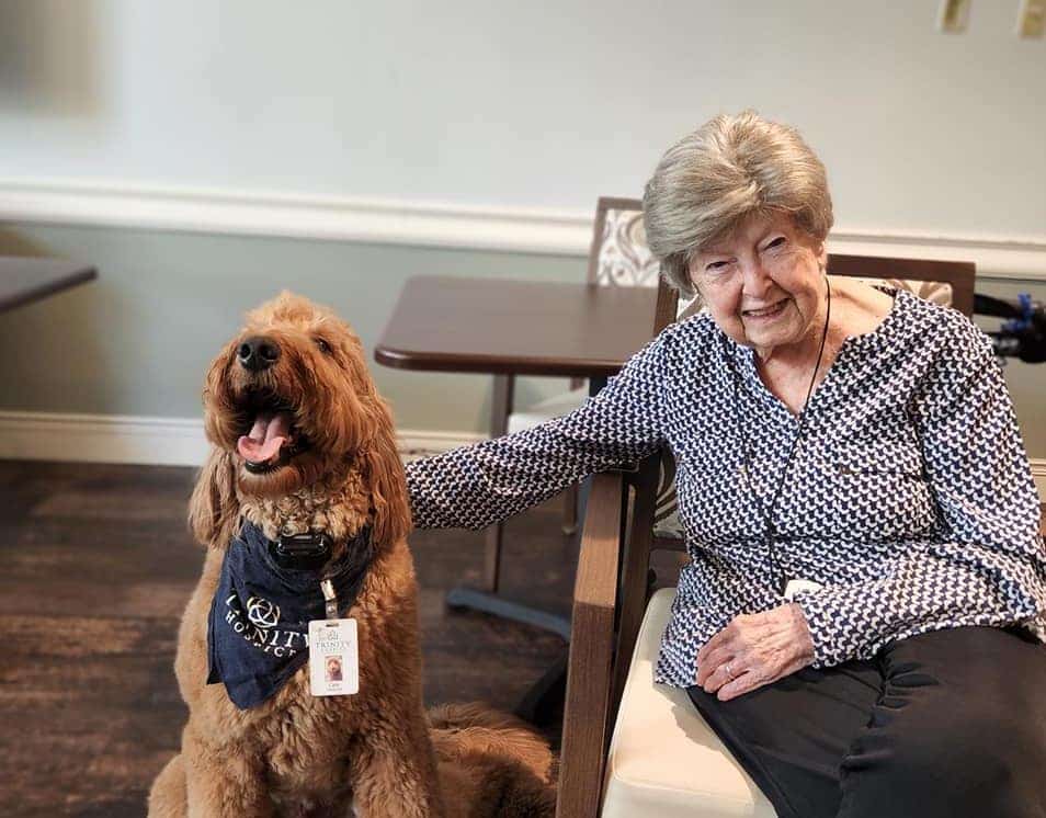 The Farrington at Tanglewood | Resident and a Clark the Trinity Hospice Dog