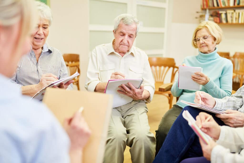 The Farrington at Tanglewood | Seniors enjoying group drawing activities