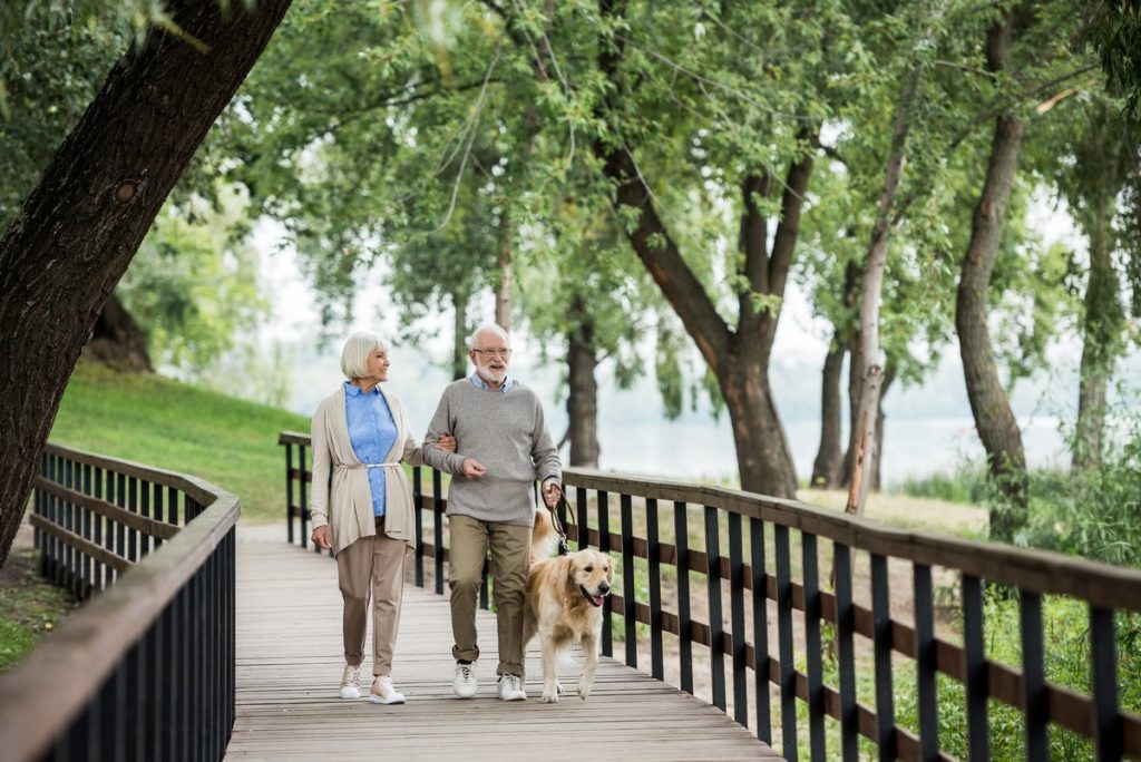 The Landing at Queensbury | Senior couple walking outdoors