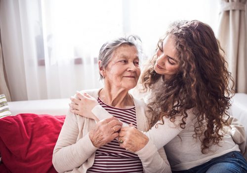 The Landing at Queensbury | Woman comforting grandmother