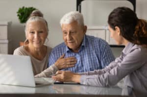 The Legacy at Crystal Falls in Leander | Older couple discussing options for senior living