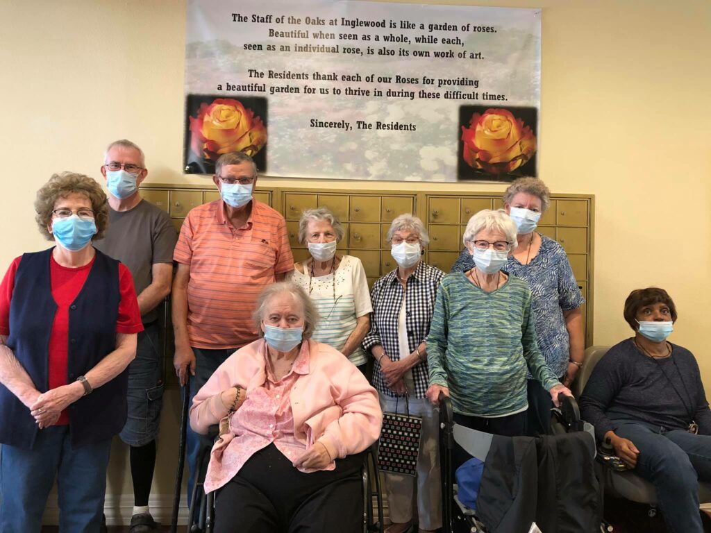 The Oaks at Inglewood | Residents with banner