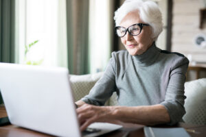 The Renaissance of Florence | Senior woman using computer