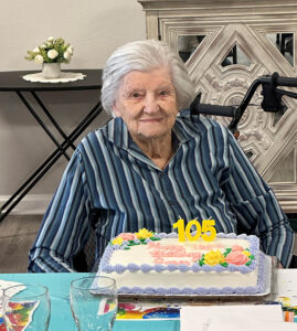 The Renaissance of Florence | Grace Noles smiles with cake for 105th birthday