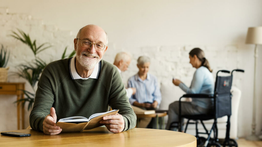 Pegasus Senior Living | Gentleman Reading Independently