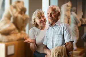 The Seasons of Reno | Senior couple looking at exhibits