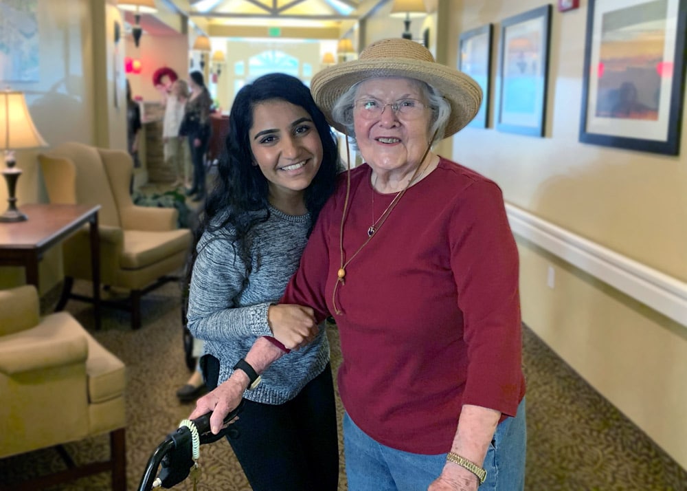 The Village at Rancho Solano | Senior smiling with young woman