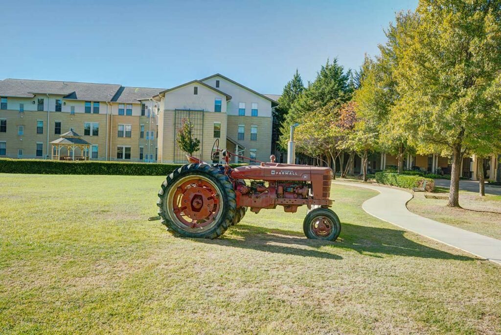 Town Village Crossing | Courtyard with Tractor