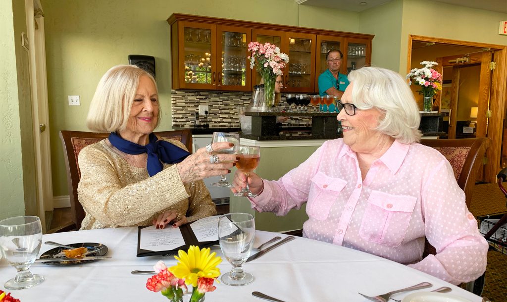 Town Village of Leawood | Senior friends enjoying a meal