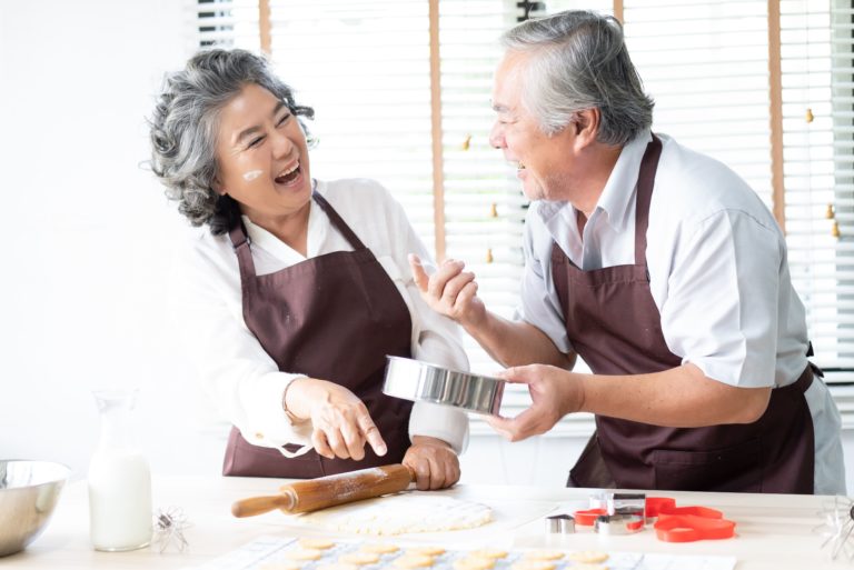 Town Village of Leawood | Senior couple baking