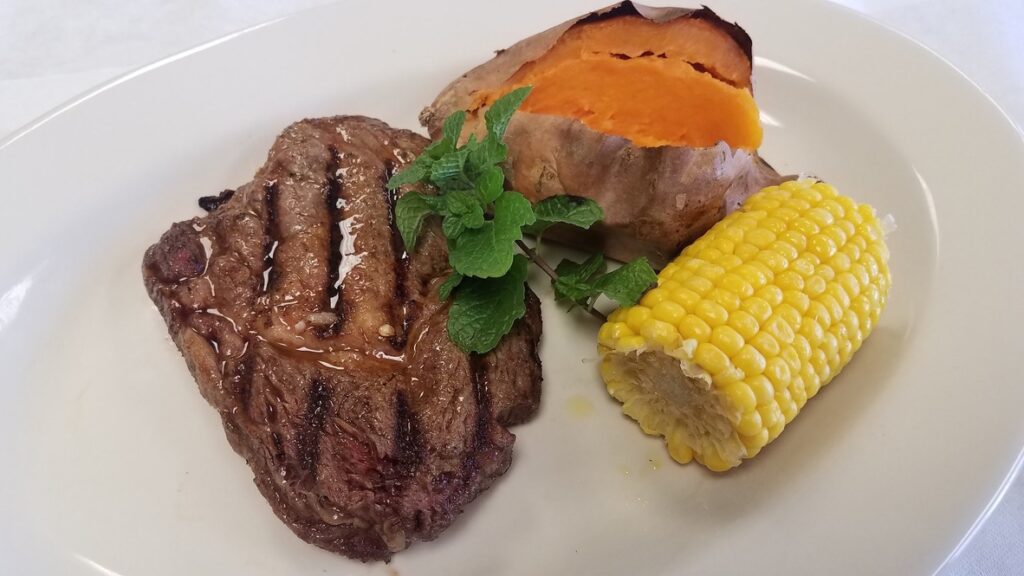 Pegasus Senior Living | Steak, sweet potato, and corn