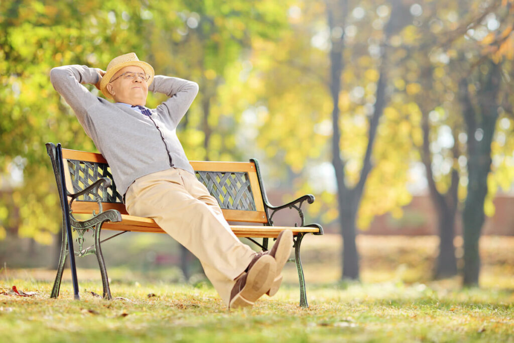 Tucson Place at Ventana Canyon | Senior man relaxing on a bench outside