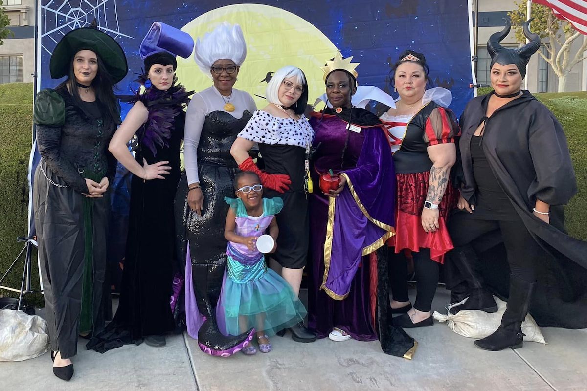 Whispering Winds of Apple Valley | Team members in costumes