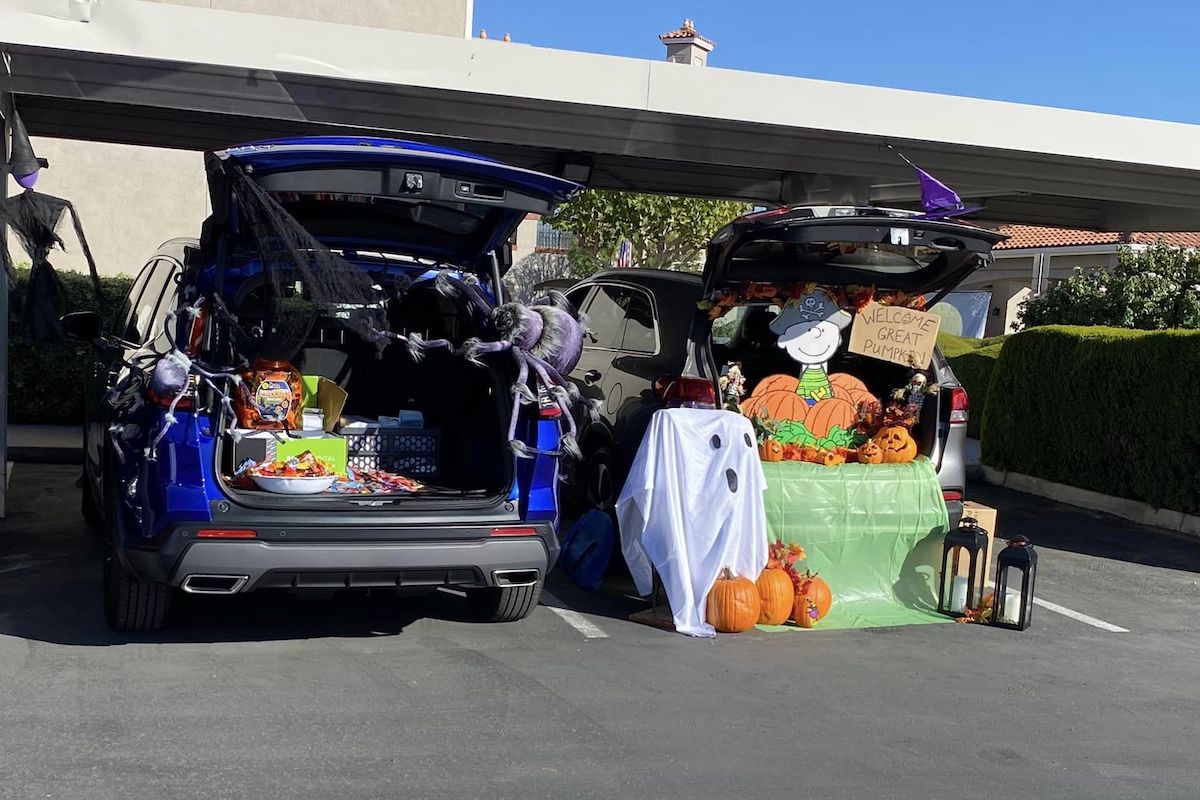 Whispering Winds of Apple Valley | Car trunks filled with candy