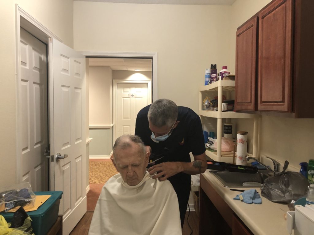 Pegasus Senior Living | Bill in makeshift barber shop