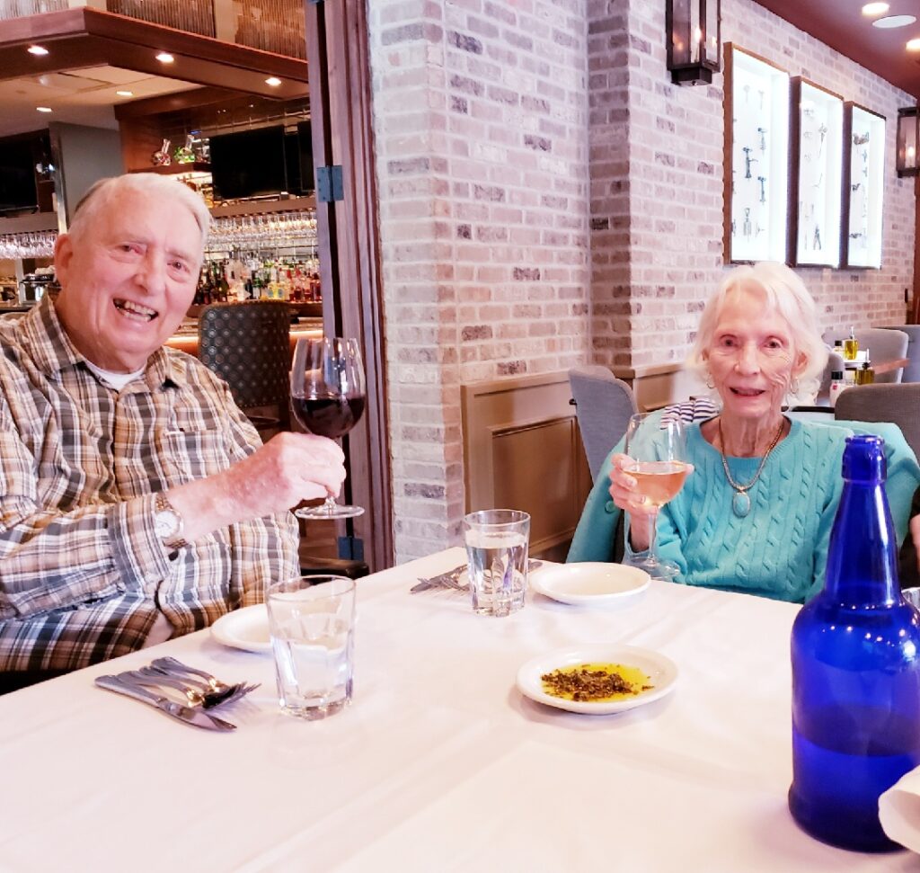 Pegasus Senior Living | Peter Vail eating dinner with his wife, Camille