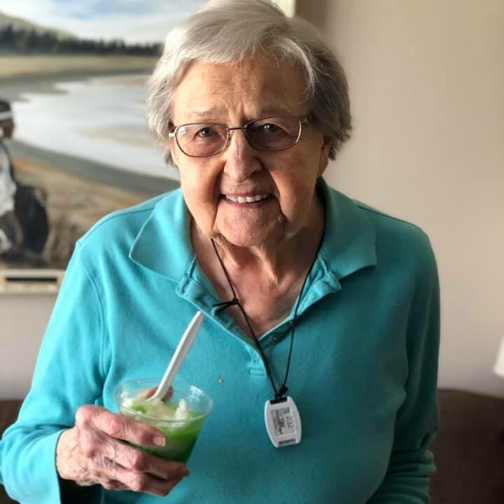 Pegasus Senior Living | Resident with drink