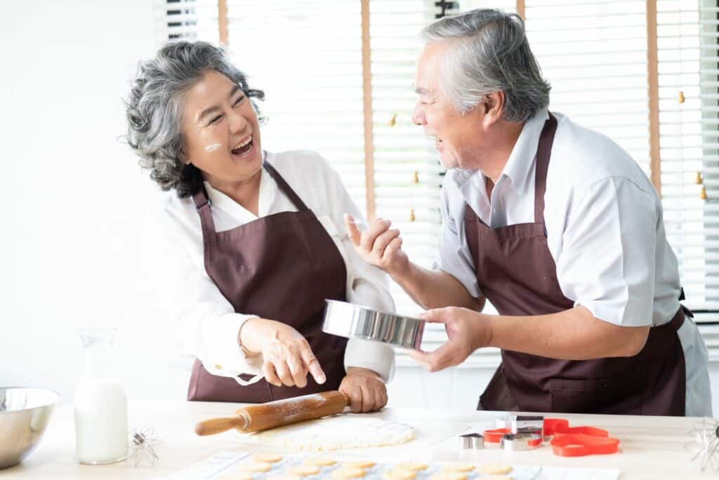 Pegasus Senior Living | Senior couple baking in kitchen