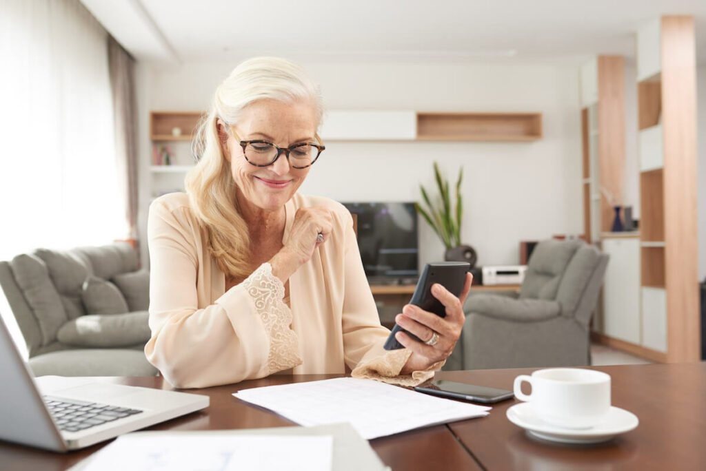 Creston Village | Women Calculating Her Finances