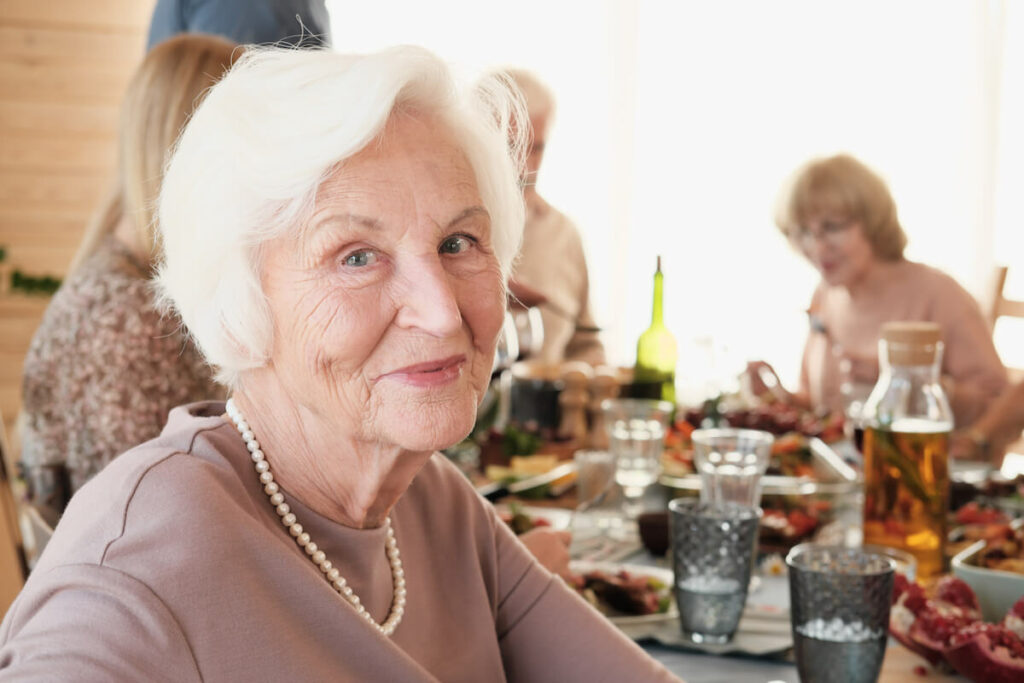 Laketown Village | Happy seniors dining together