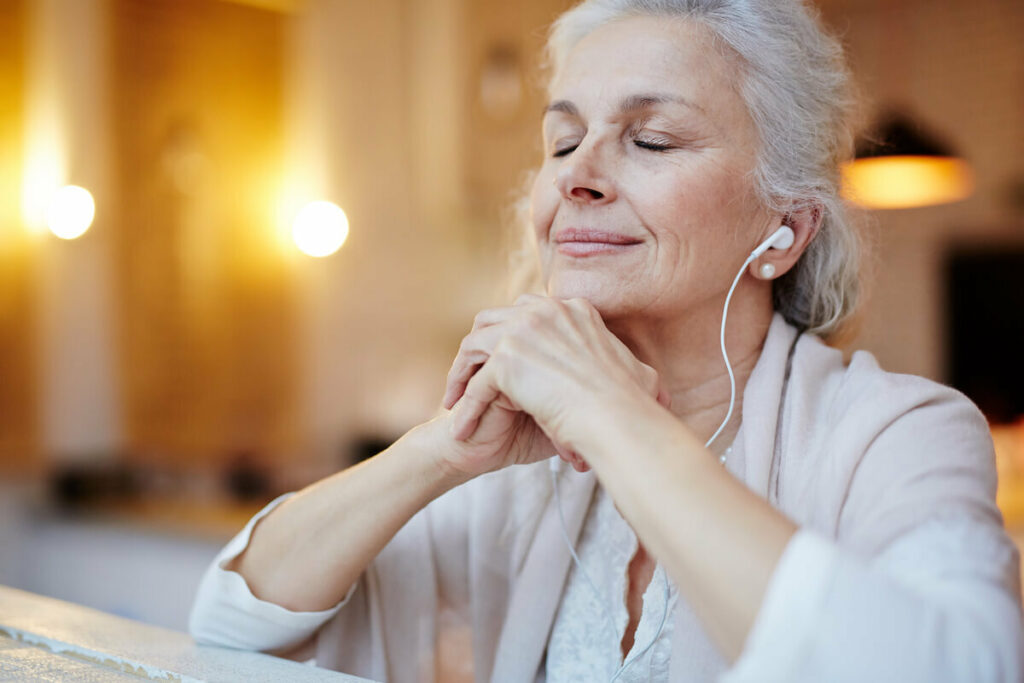 The Havens at Antelope Valley | Senior listening to music