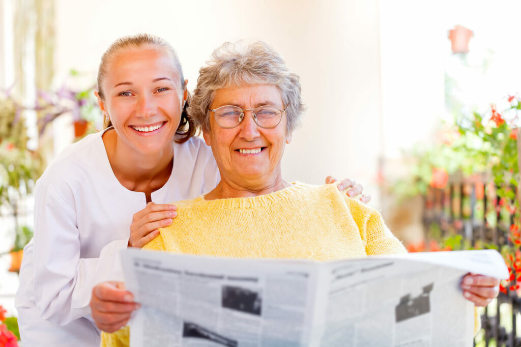 The Village at Rancho Solano | Happy senior and caregiver