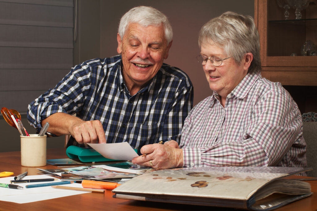 North Point Village | Rockford area seniors looking at a photo album