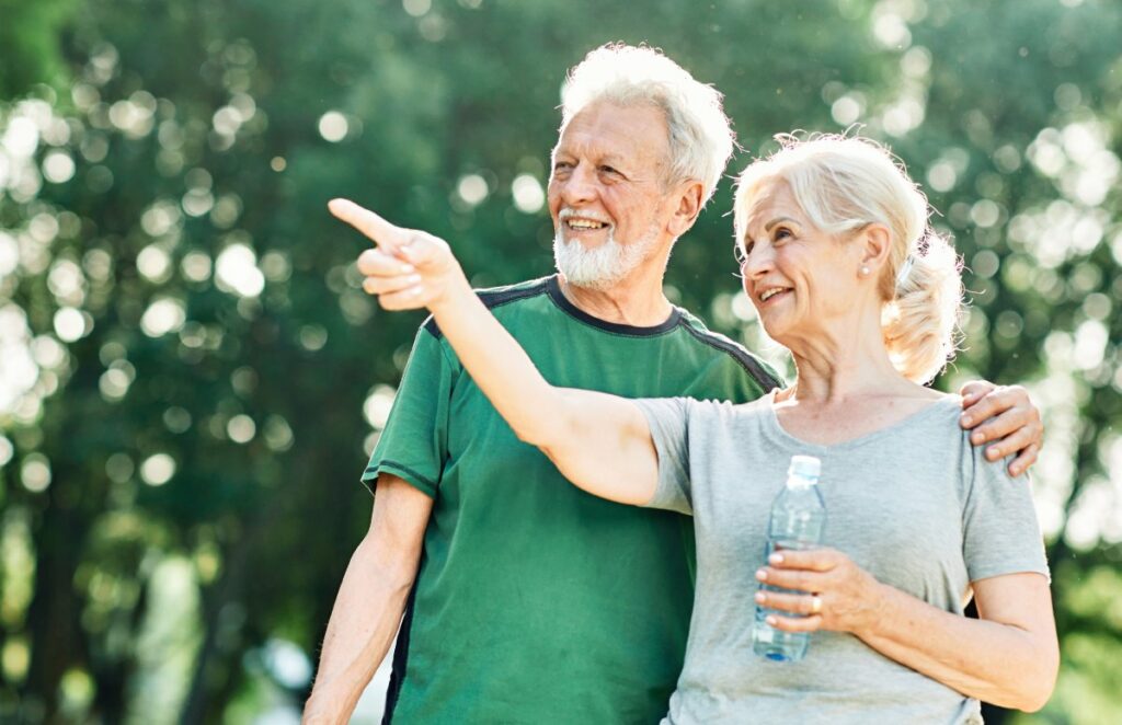 Dunwoody Place | Senior man and woman outside looking around