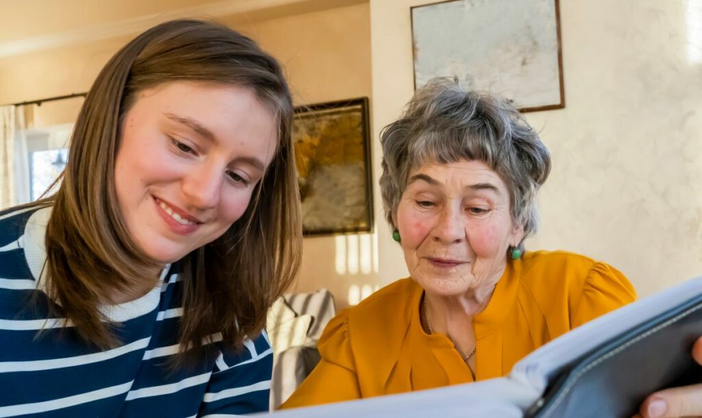 Tucson Place at Ventana Canyon | Senior woman looking through photo album