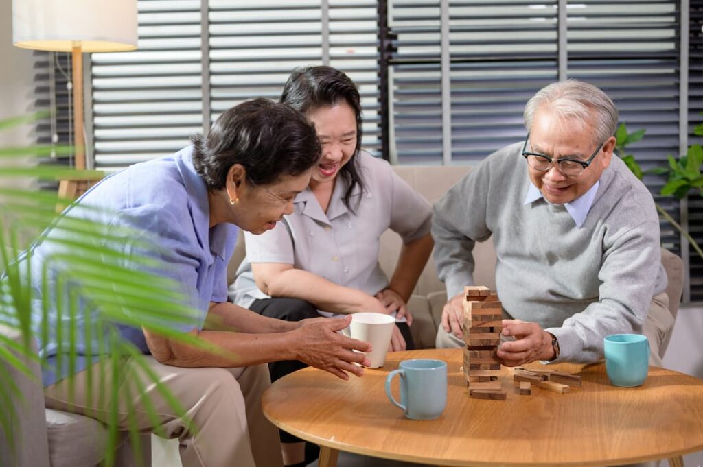 Village at Rancho Solano | Care homes in Fairfield CA - group of seniors playing game together