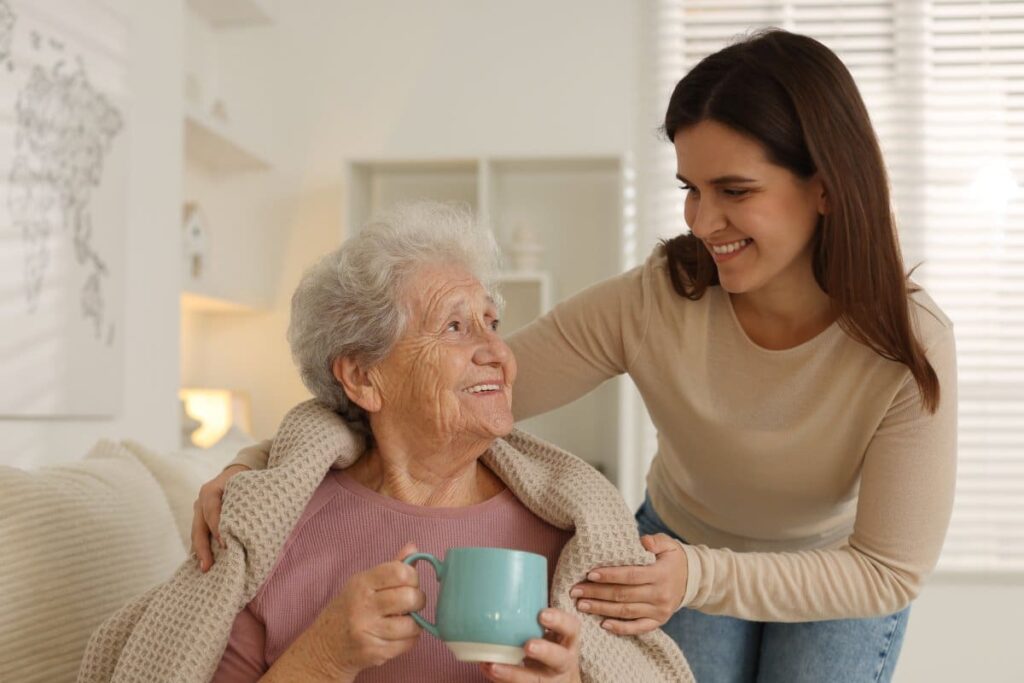 Pegasus Senior Living | Carefiver assisting resident